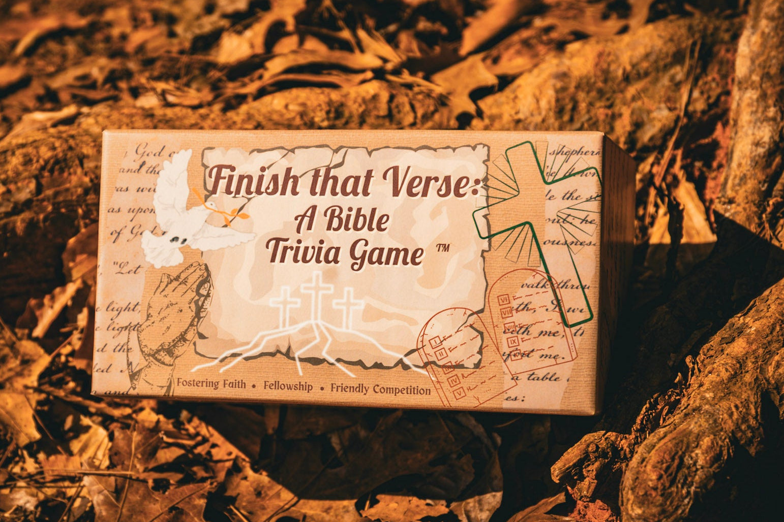 Bible Trivia Game box on a textured surface with leaves